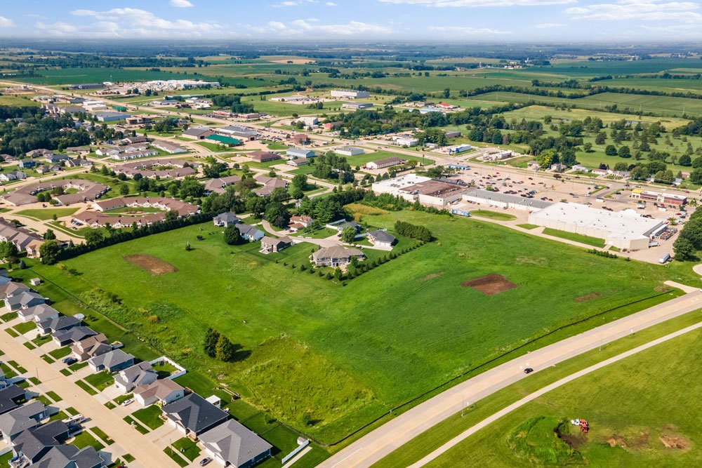 Aerial photograph of the Stone Meadows site in Waverly, with nearby homes and shopping